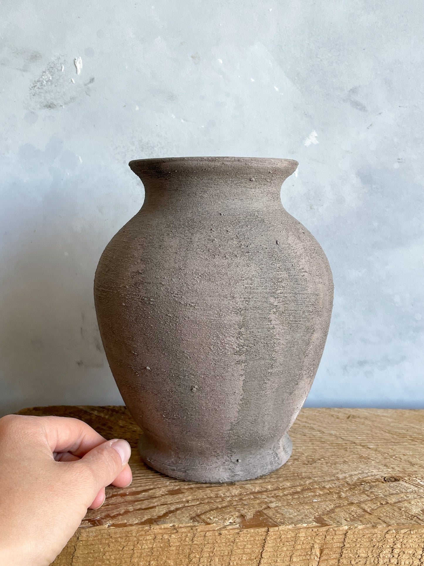 Close-up of Hand-Finished Texture on Aged Brown Vase