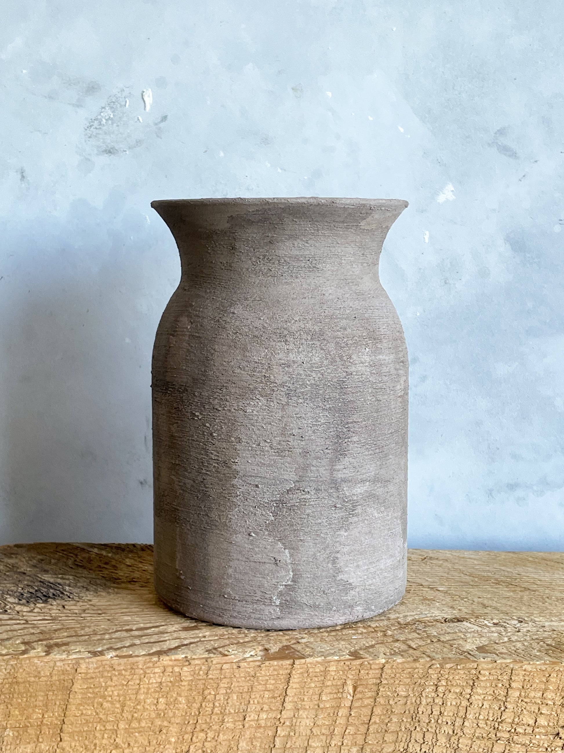 Close-up of Hand-Finished Detail on Aged Brown Vase