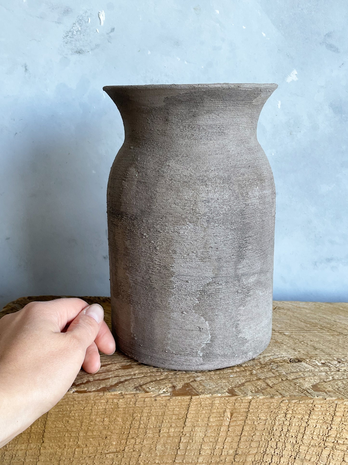 Close-up of Hand-Finished Detail on Aged Brown Vase