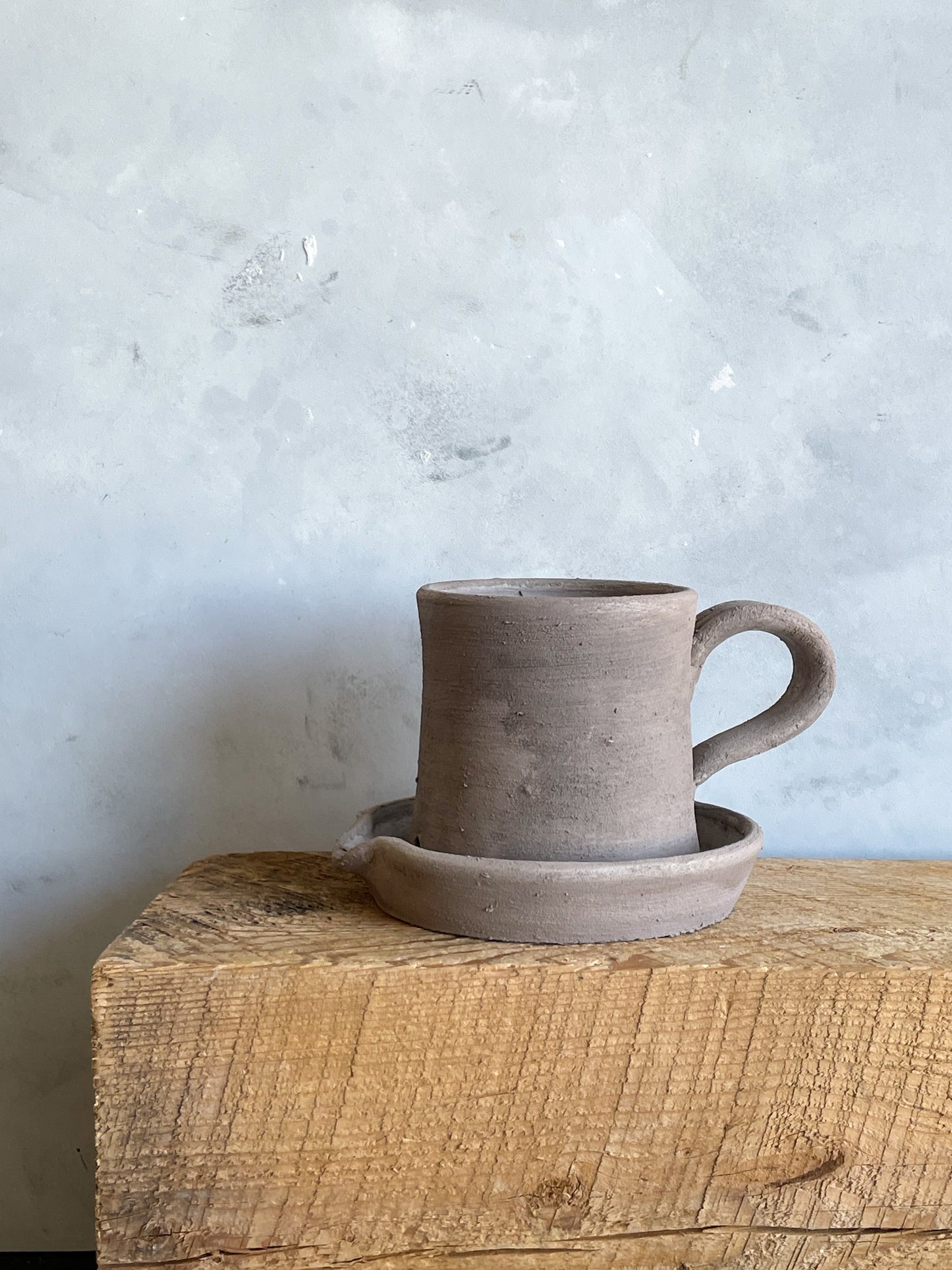 Side view of the Earth Vase showing the unique texture and handmade craftsmanship.