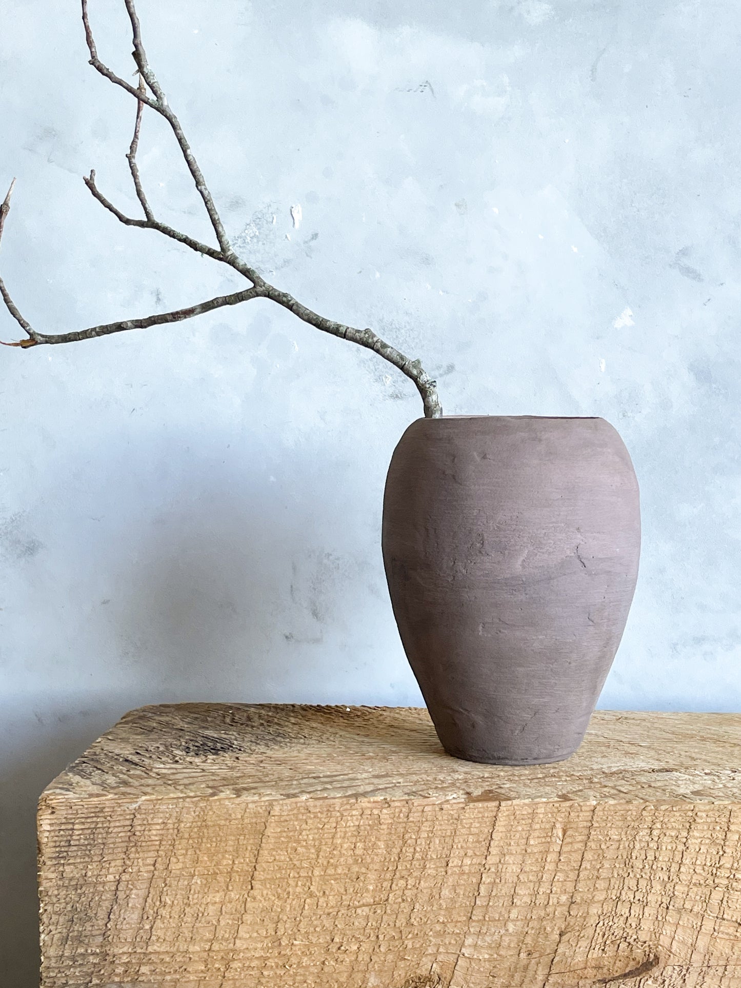 Close-up of Hand-Finished Texture on Aged Brown Vase