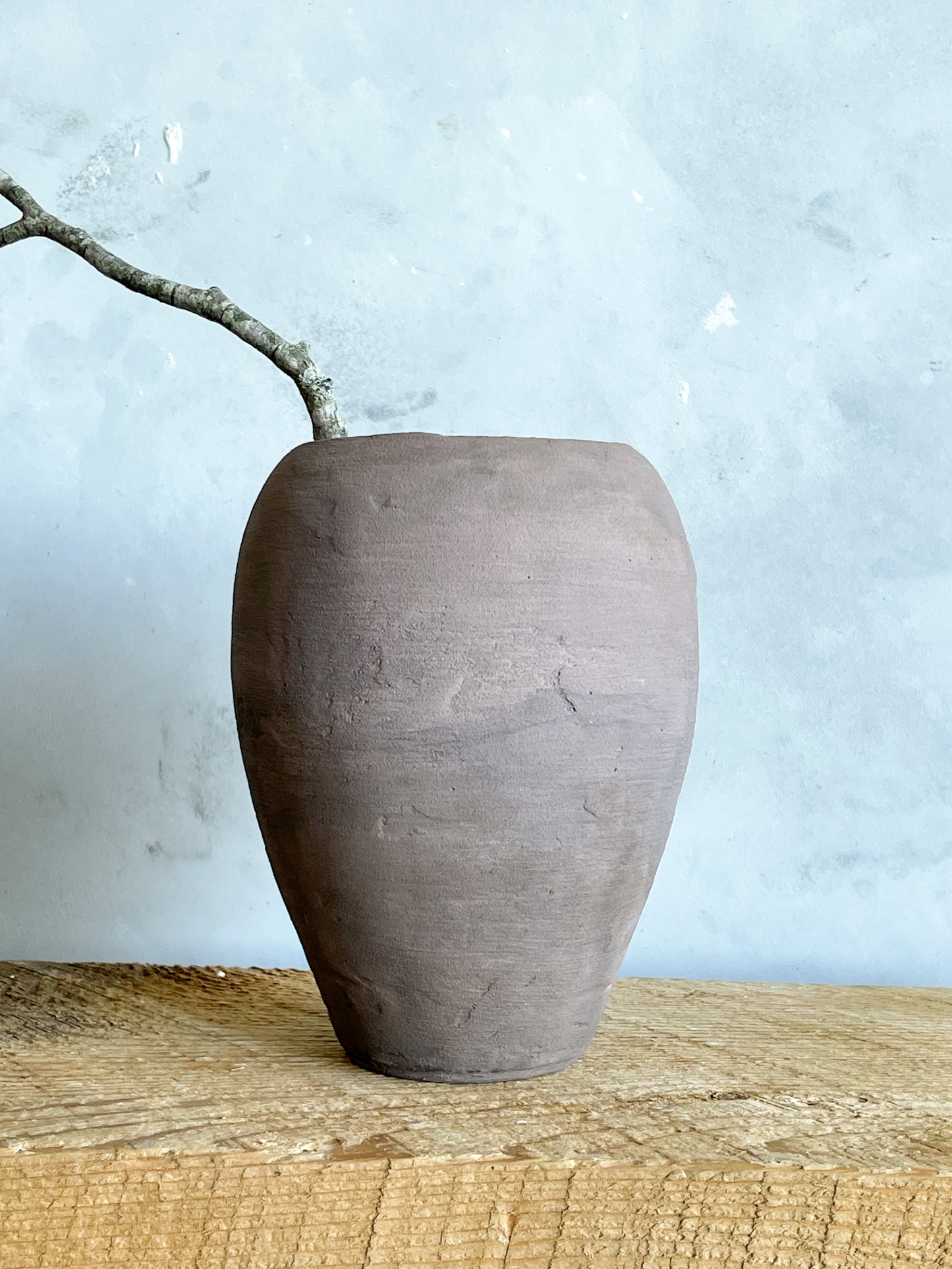 Close-up of Hand-Finished Texture on Aged Brown Vase