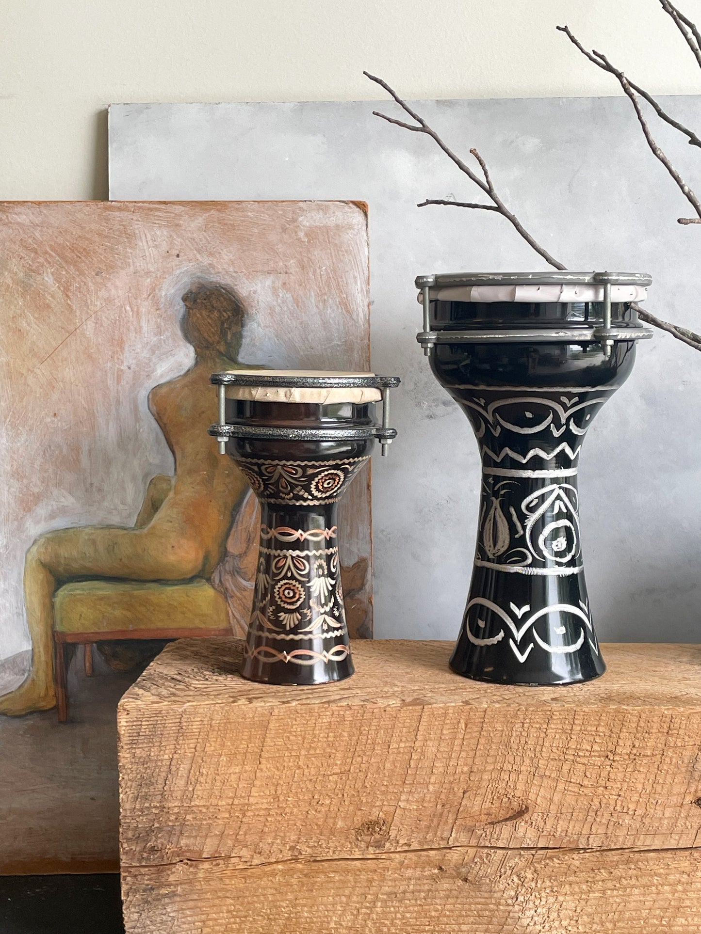 antique pair of etched metal drums