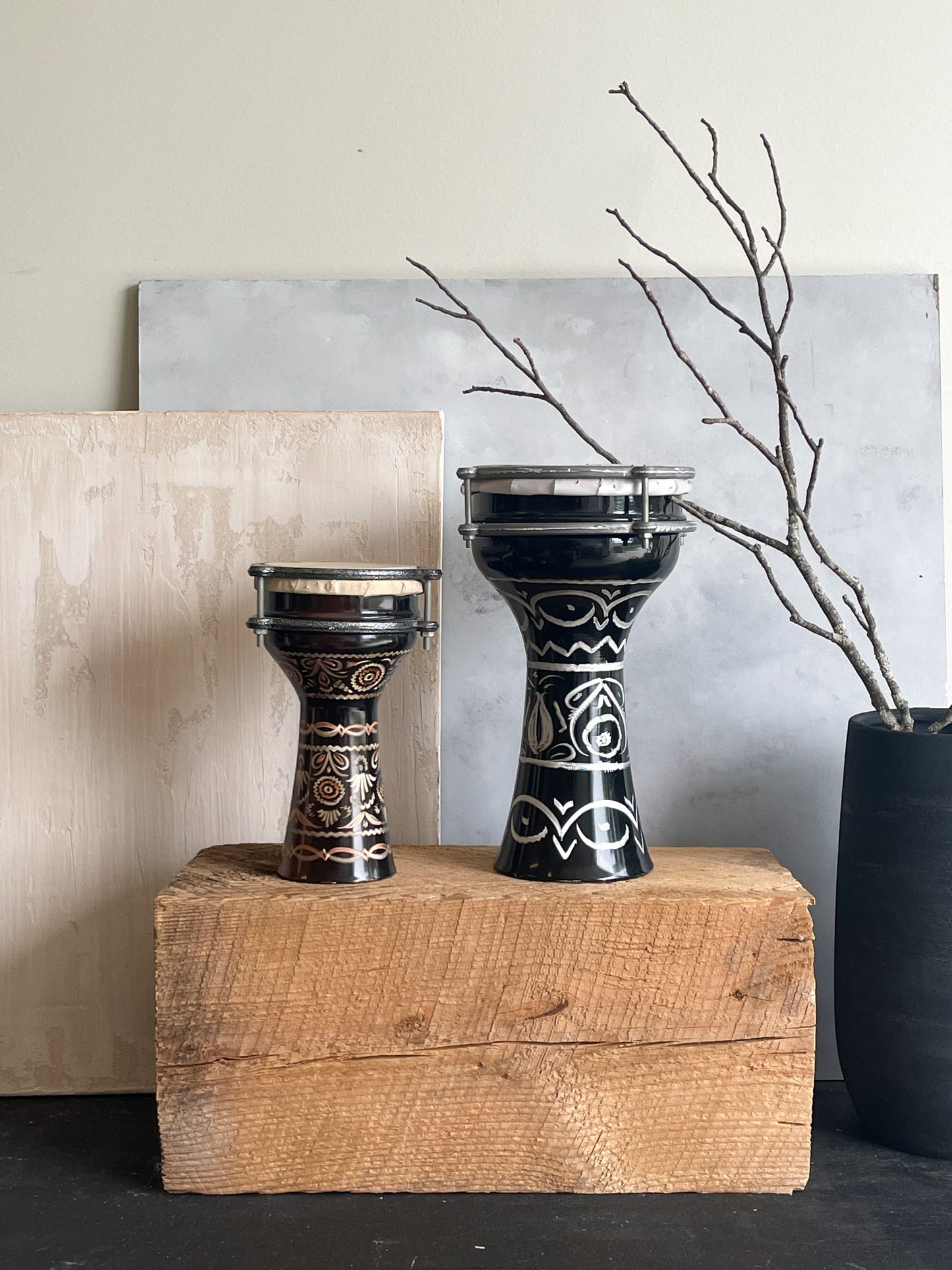 antique pair of etched metal drums