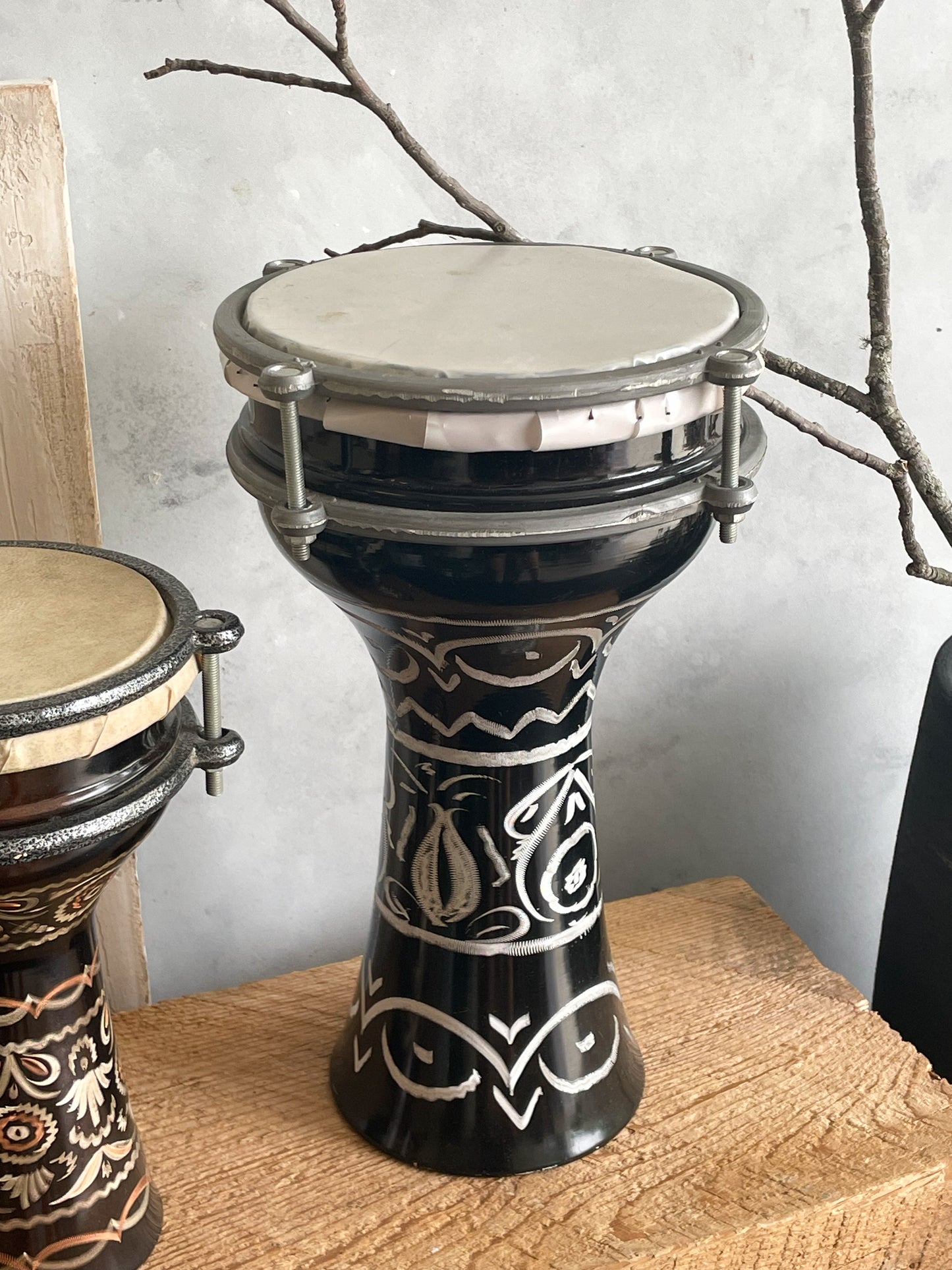 antique pair of etched metal drums