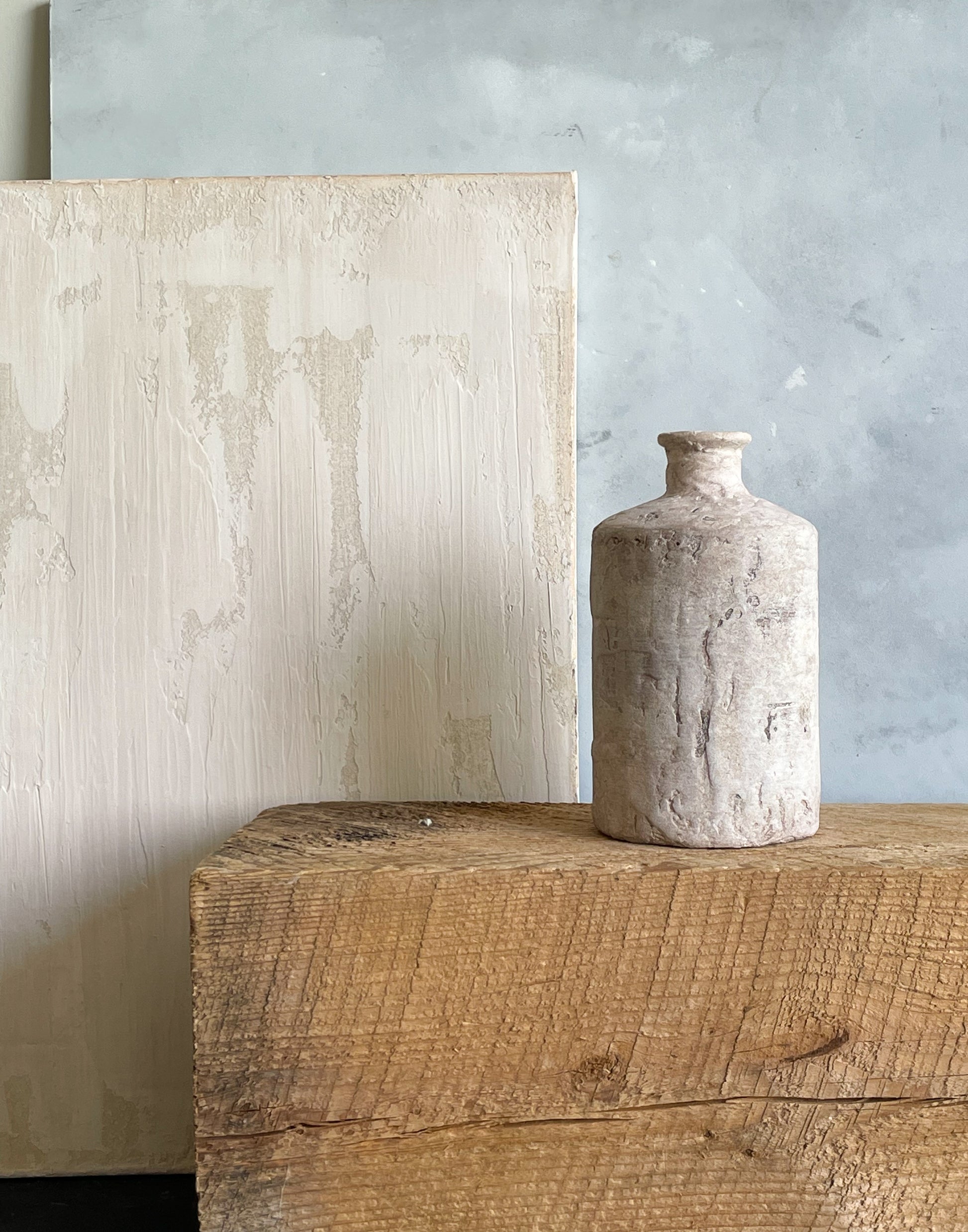 Earthy and neutral home decor featuring the rustic white textured vase.