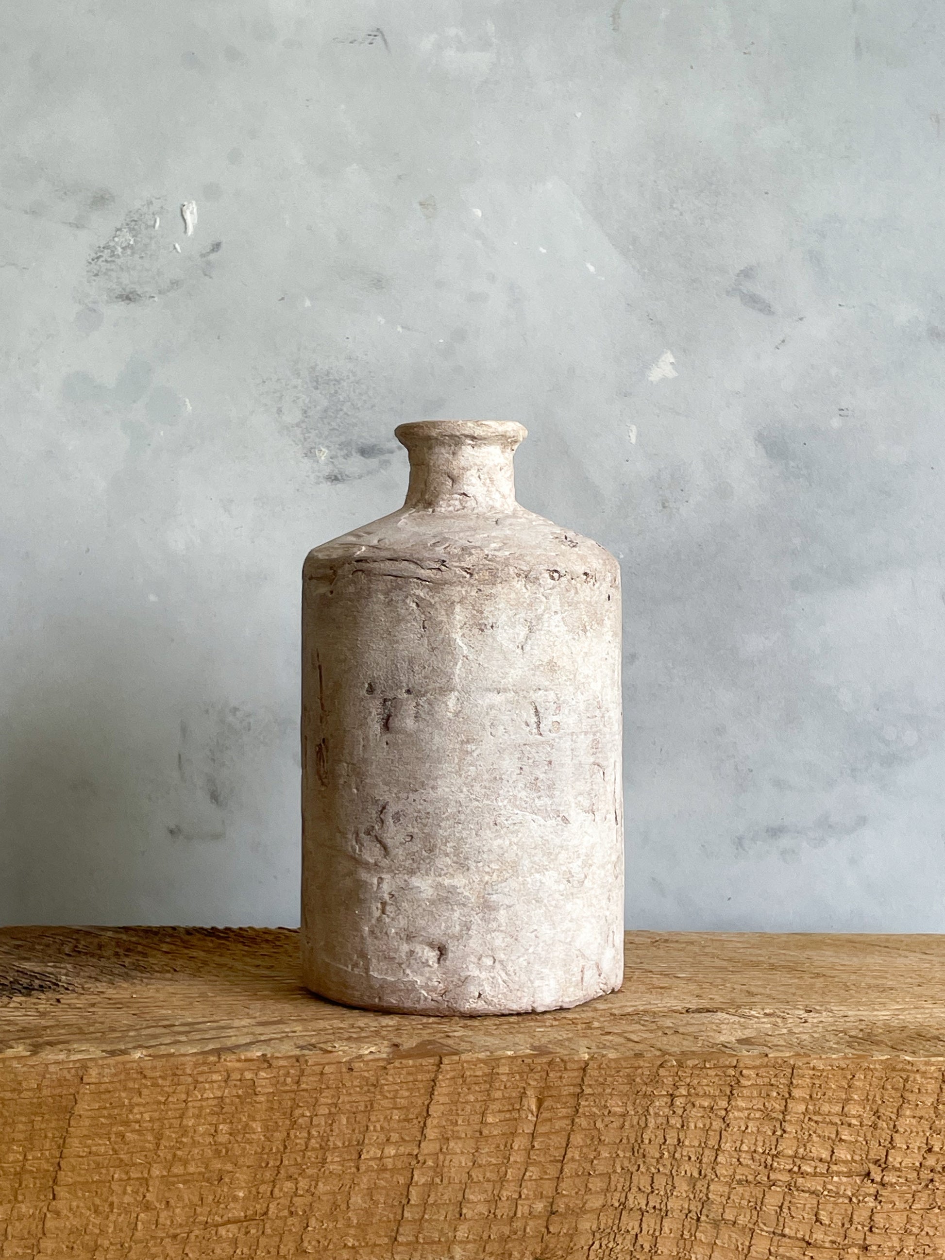 Close-up of the hand-finished texture on the Milos Collection vase.