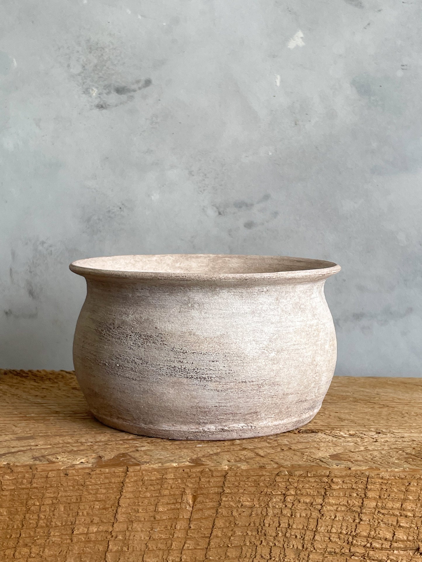 Close-up of Milos Collection rustic white textured planter vase, showing handcrafted details