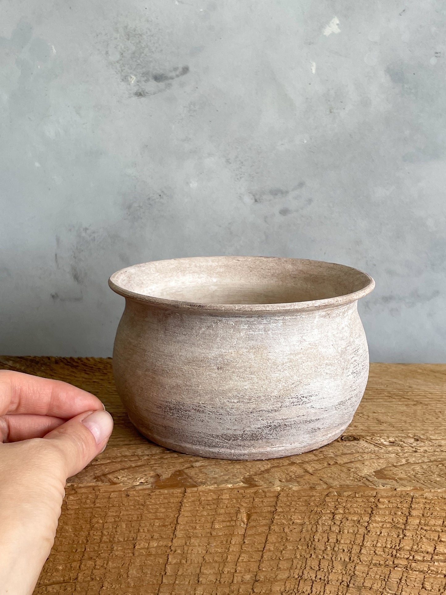 Close-up of Milos Collection rustic white textured planter vase, showing handcrafted details