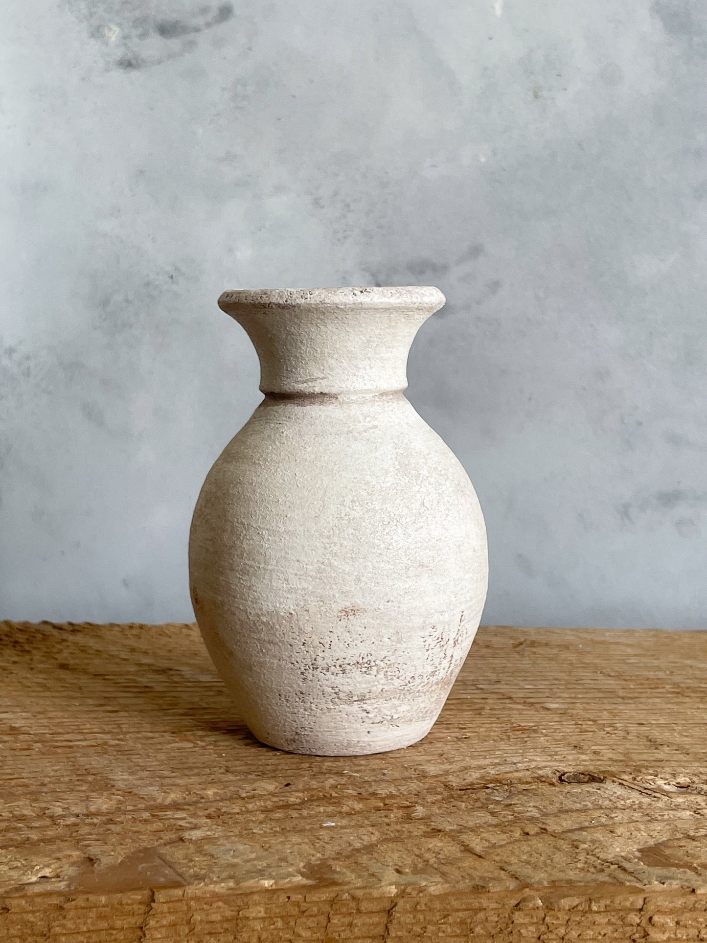 Close-up highlighting the unique texture of the Milos Collection mini vase.