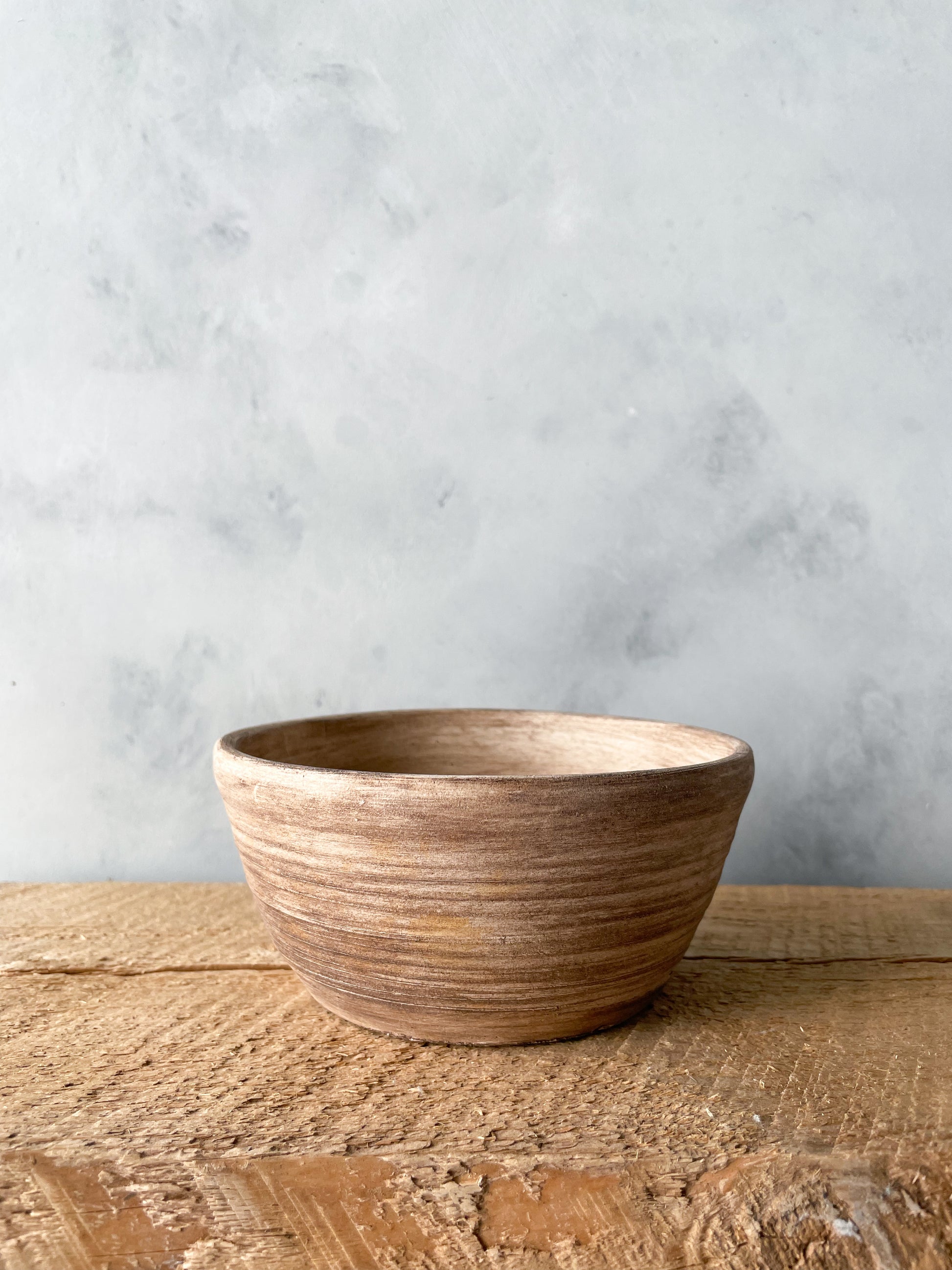 Side view of Earth Collection Decorative Dish showing textured finish