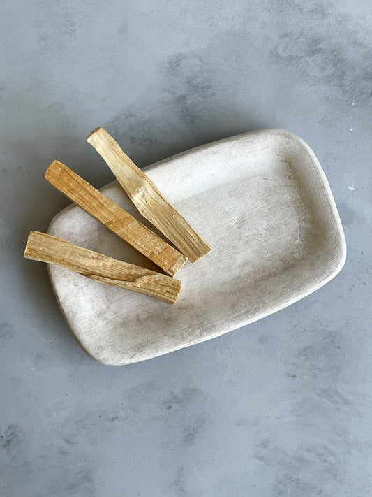 Lifestyle shot of the ceramic tray in use as a catchall dish.