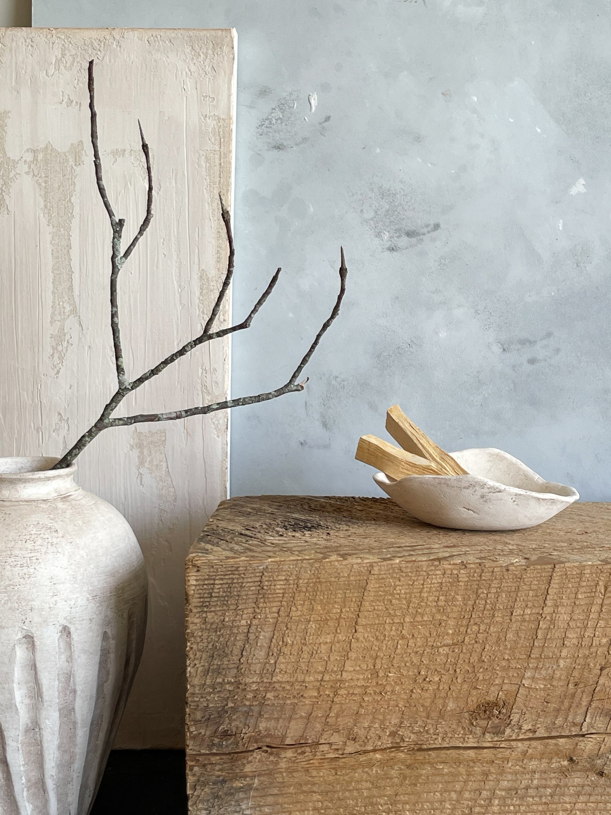 Handmade ceramic rustic dish from the Milos Collection on a wooden table.