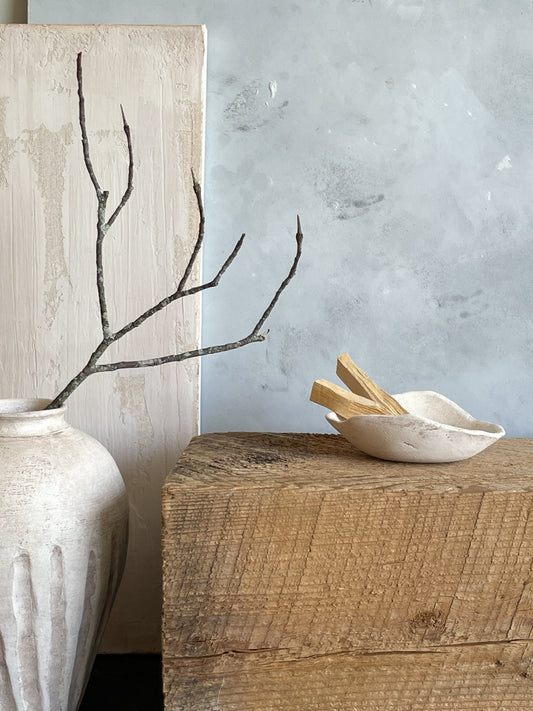 Handmade ceramic rustic dish from the Milos Collection on a wooden table.