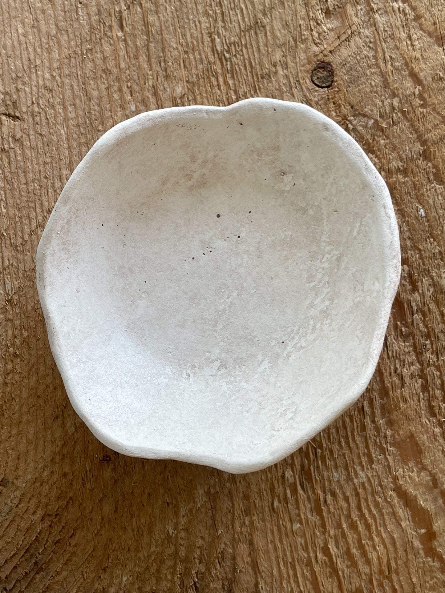 Overhead view of the Milos Collection rustic dish displaying neutral tones.