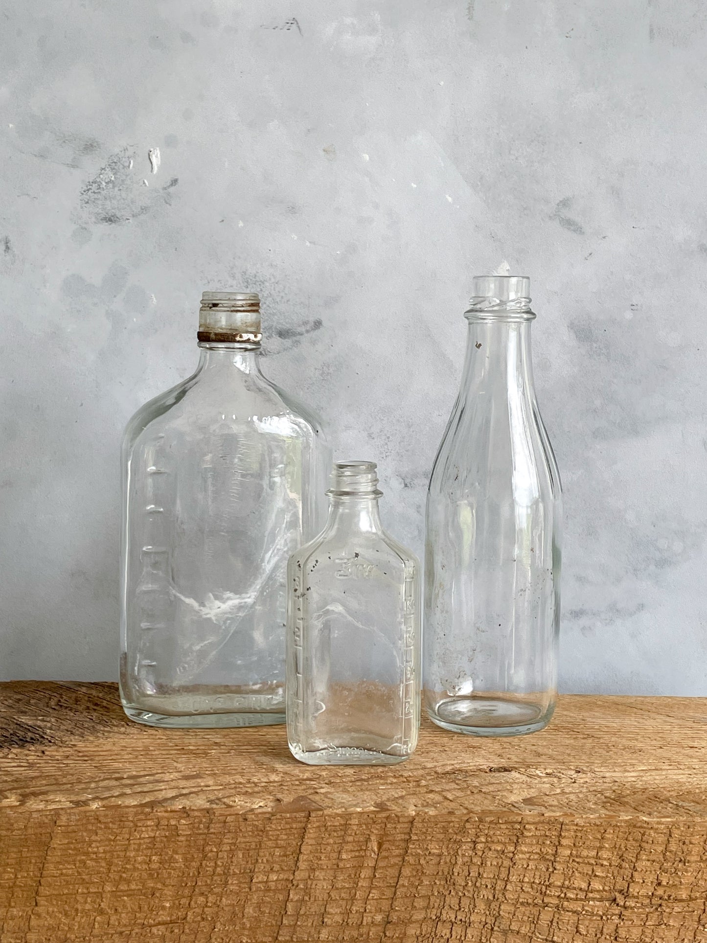 antique clear glass bottles | set 6